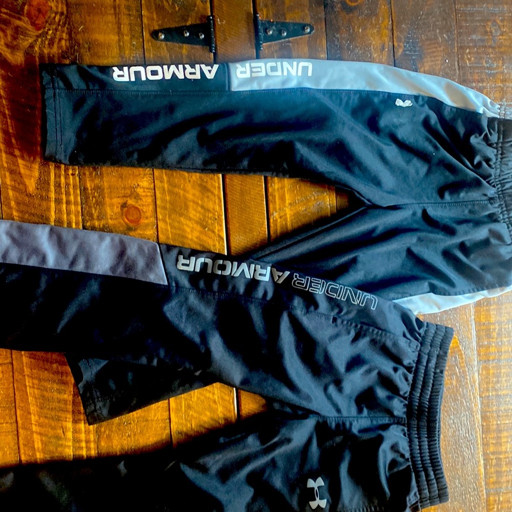 2 pairs of Under Armour Size 4T pants.
